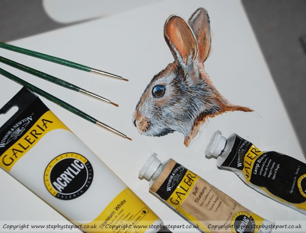 Rabbit head painting, green paintbrushes and Galeria Acrylics