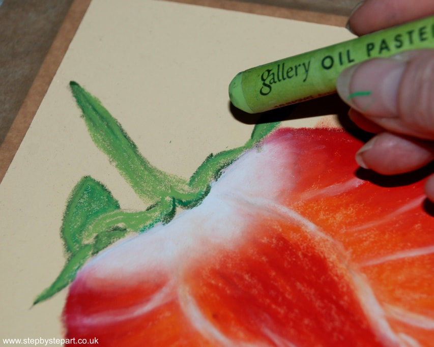 Applying a spring green oil pastel over the green stem of a Strawberry drawing