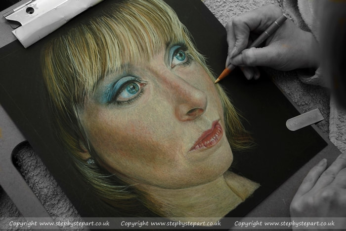 Self portrait of artist Karen M Berisford completed in Coloured pencils on Black Ursus paper