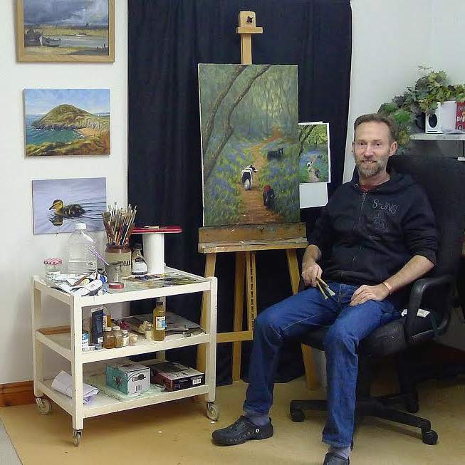 Welsh artist Chris Chalk in his art studio