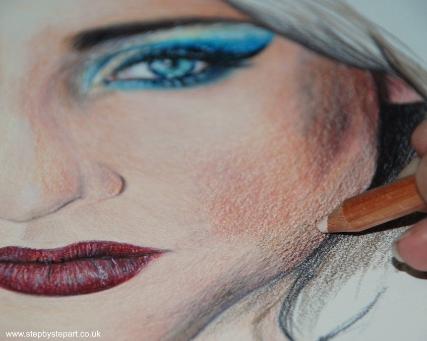 Burnishing tonal values on a female portrait in coloured pencils