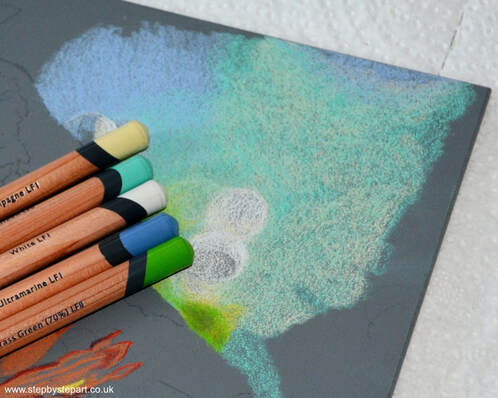 Derwent Lightfast coloured pencils application on grey Ampersand Pastelbord