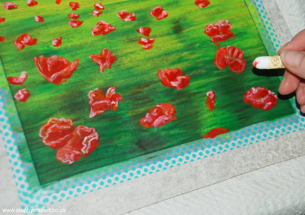 Applying highlights to the Poppies using the White Sennelier oil pastel
