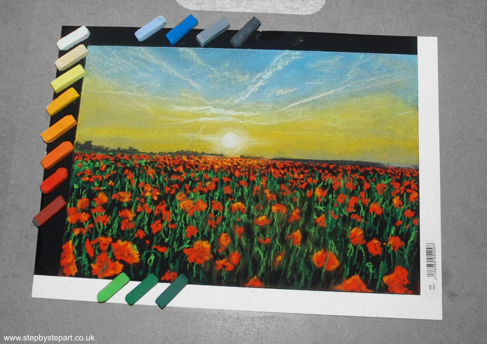 Soft pastel drawing of a sunset over a poppy field and Inscribe pastels