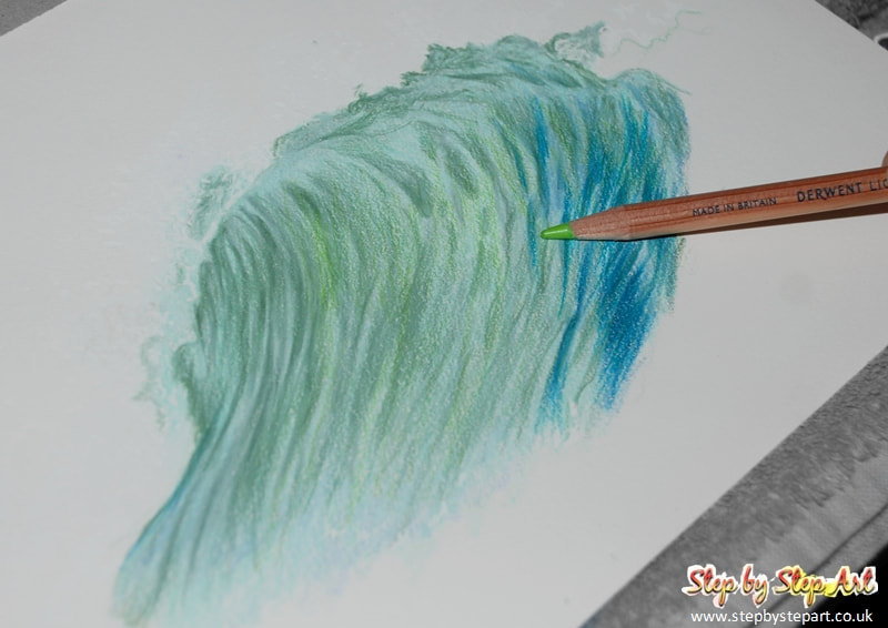 Applying grass green 70% to a coloured pencil tutorial