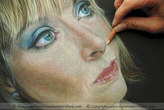 Self portrait being created in Caran Dache Luminance Coloured pencils of the Artist Karen M Berisford