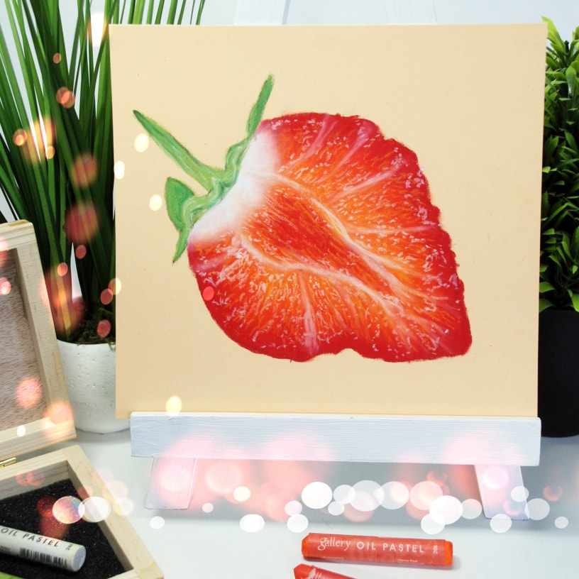 A juicy strawberry created in oil pastels for a free tutorial